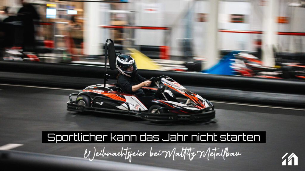 Ein Mitarbeiter von maltitz Metallbau fährt in schneller Bewegung um eine Kurve in der Karthalle Arena E. Weihnachtsfeier bei Maltitz Metallbau – Sportlicher kann das Jahr nicht starten
